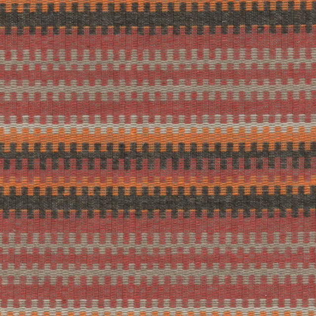 Close-up of Cuchillas Multi woven stripes in charcoal, rust, coral and orange