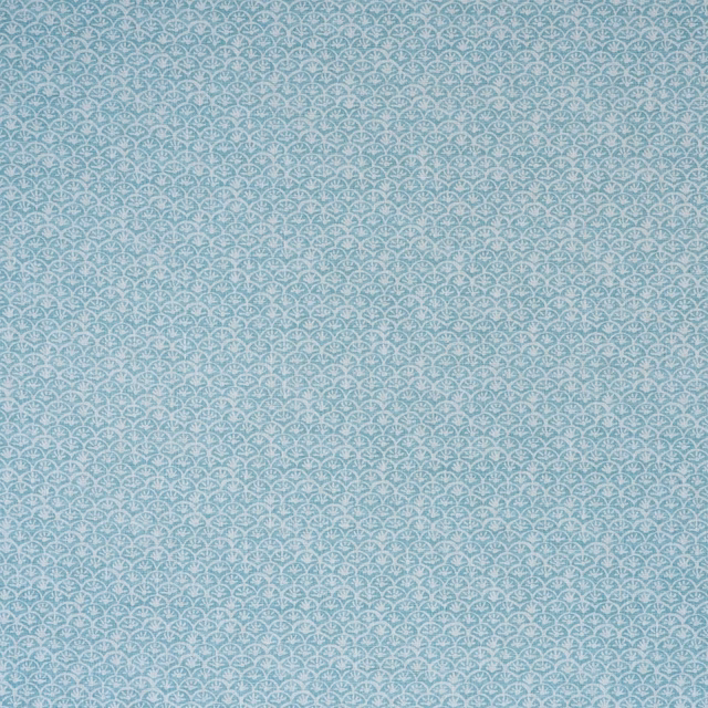 Muted aqua-teal fabric with tiny cream scalloped motifs and fine woven texture