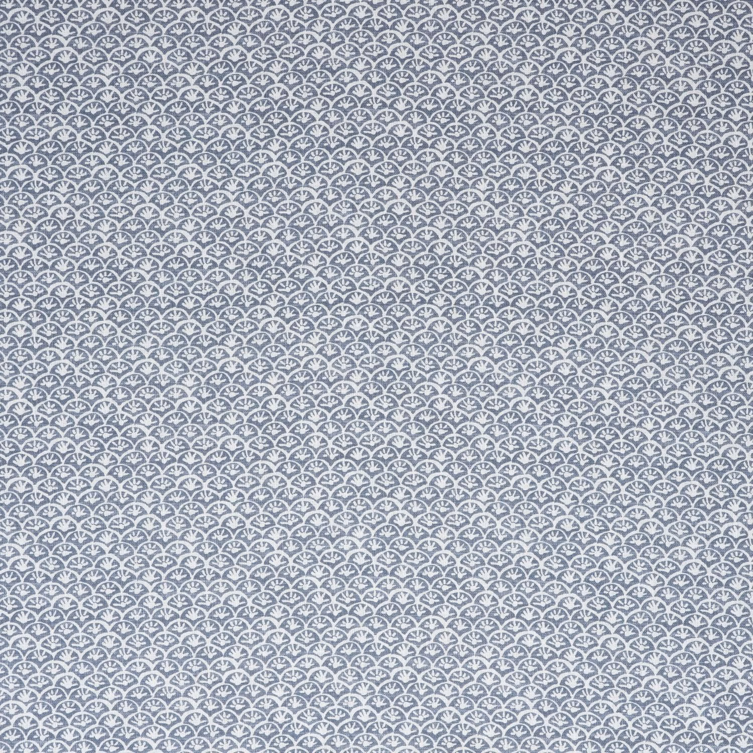 Muted iris-blue fabric with tightly repeated tiny white daisy motifs in rows