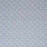 Muted iris-blue fabric with tightly repeated tiny white daisy motifs in rows