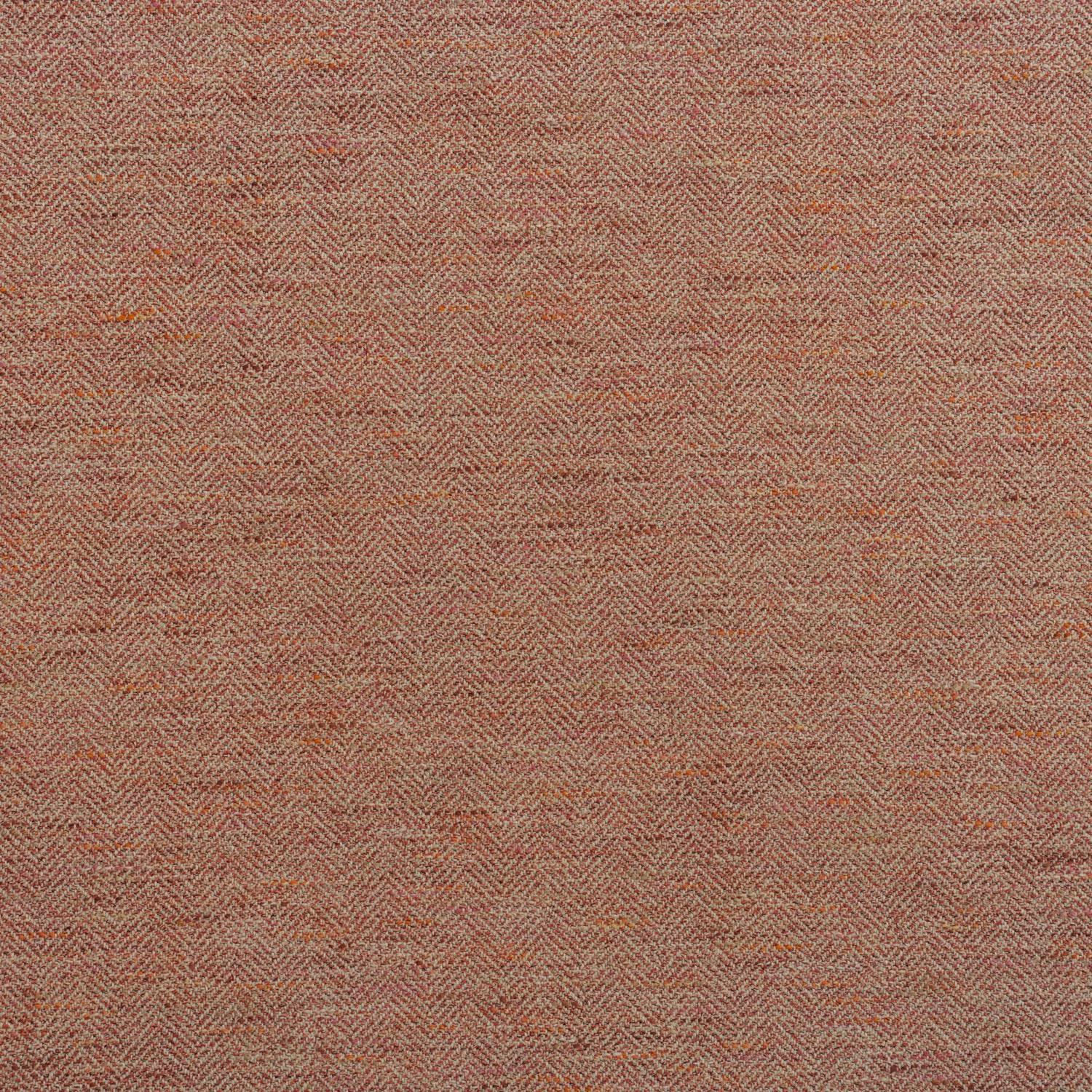 Close-up of muted rosy terracotta fabric with fine woven herringbone texture
