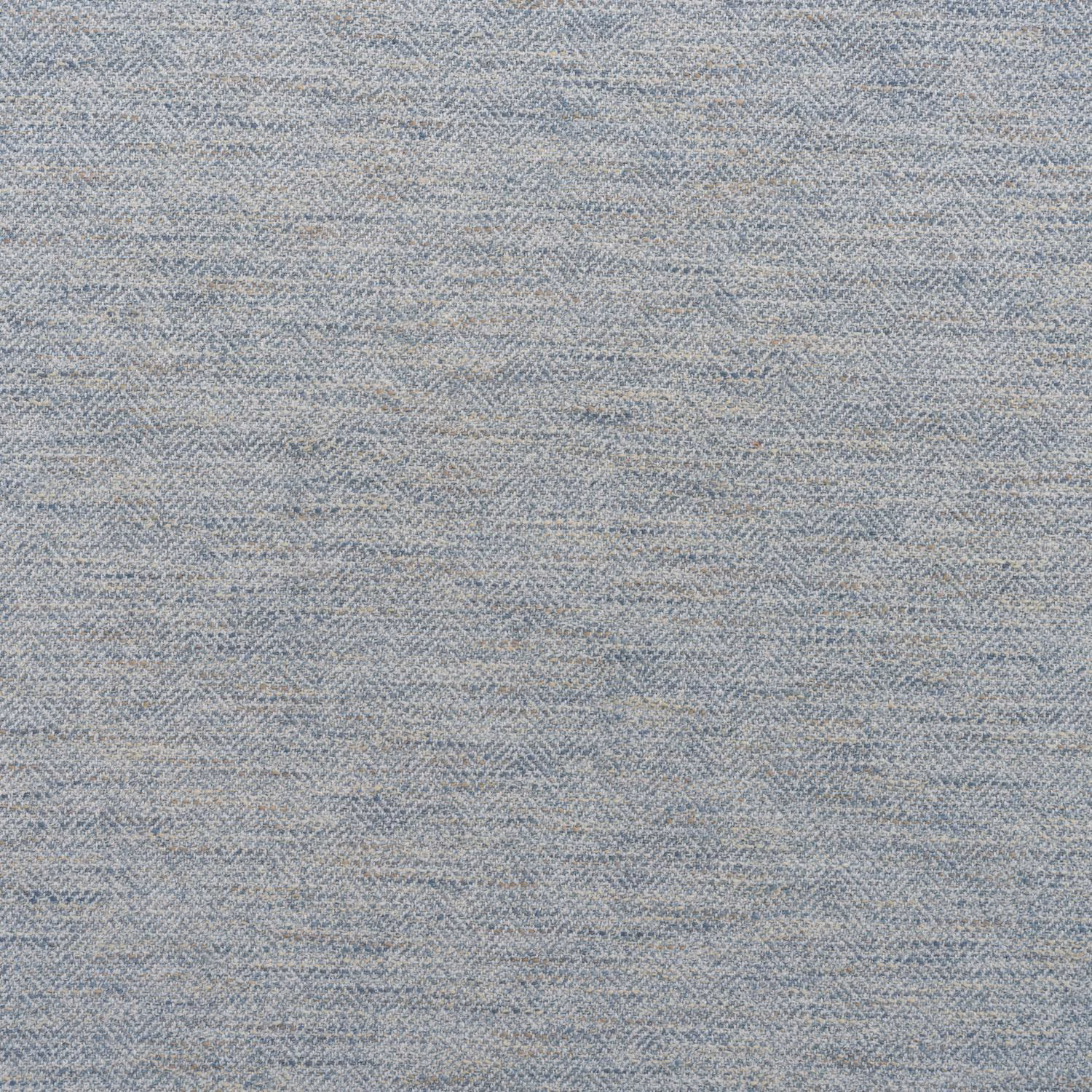Pale blue-grey woven swatch with fine, softly broken herringbone texture