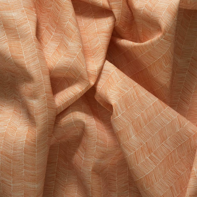 Warm terracotta outdoor fabric with fine irregular chevron lines in gathered folds