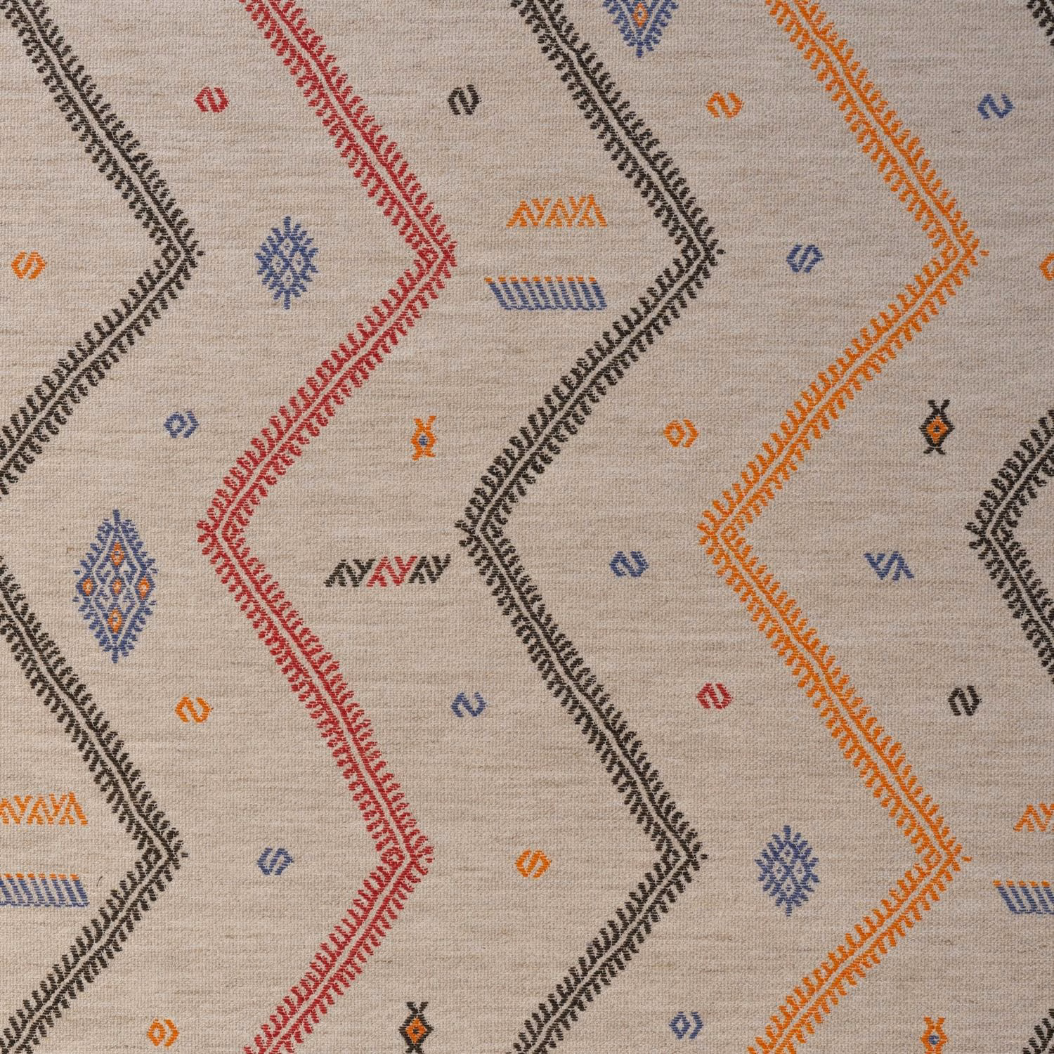 Warm sand woven ground with black, rust, red and blue geometric zigzags