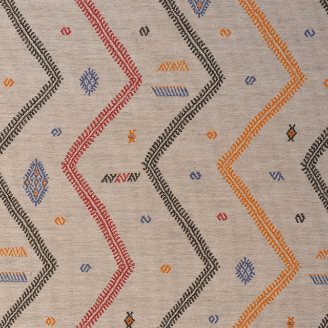 Warm sand woven ground with black, rust, red and blue geometric zigzags