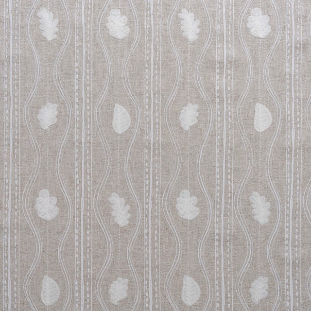 Greige woven fabric with ivory leaves, wavy lines and dotted vertical stripes
