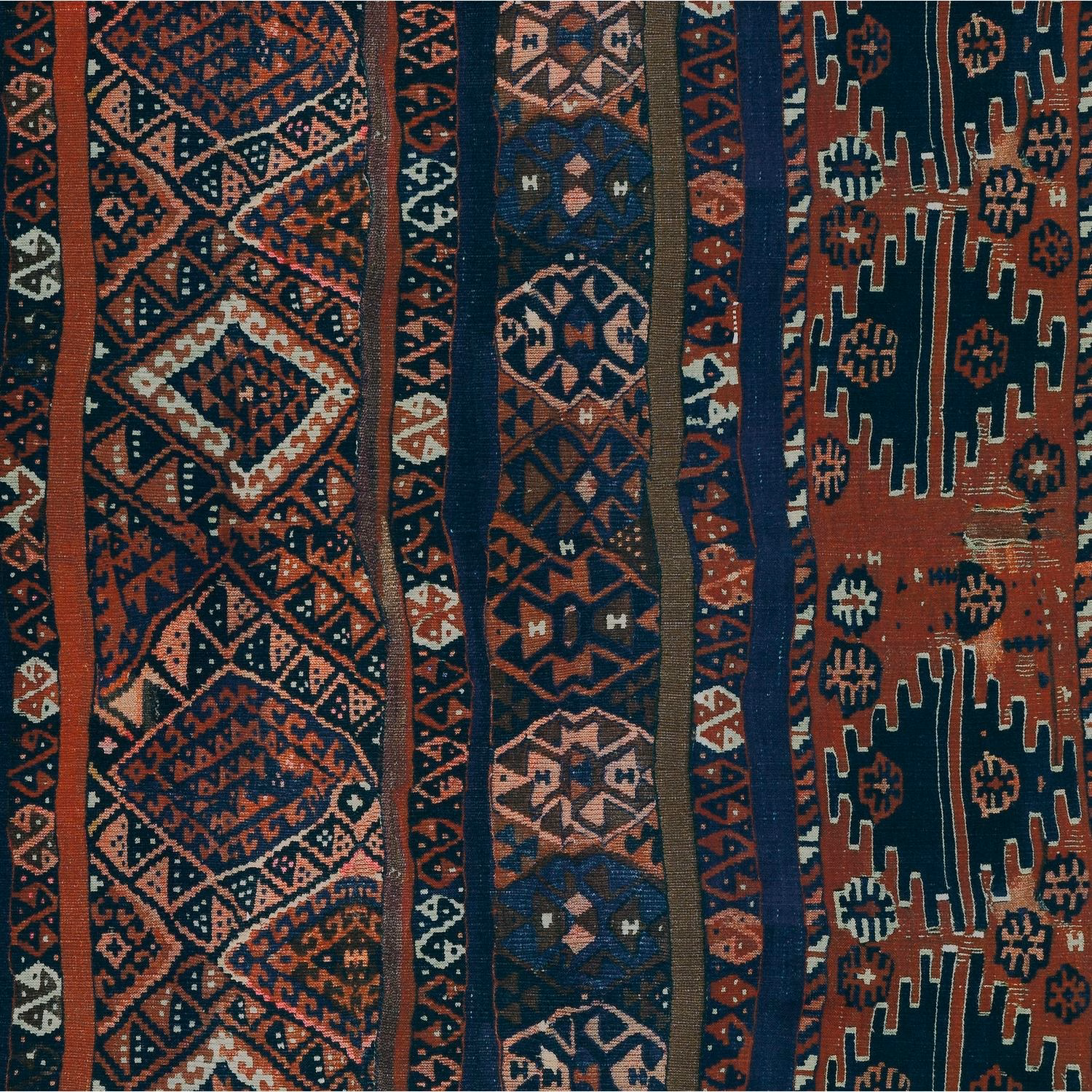 Rust, teal and navy geometric bands with tactile woven-looking texture