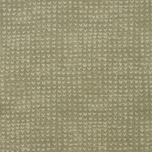 Muted lichen-olive woven fabric with dense tiny cream V motifs and mottled texture
