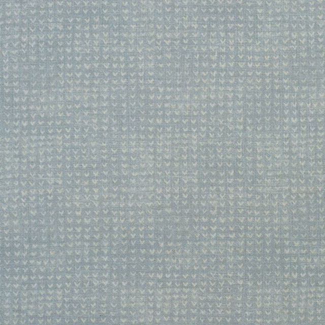 Misty blue-grey woven fabric with tiny pale repeated chevron motifs