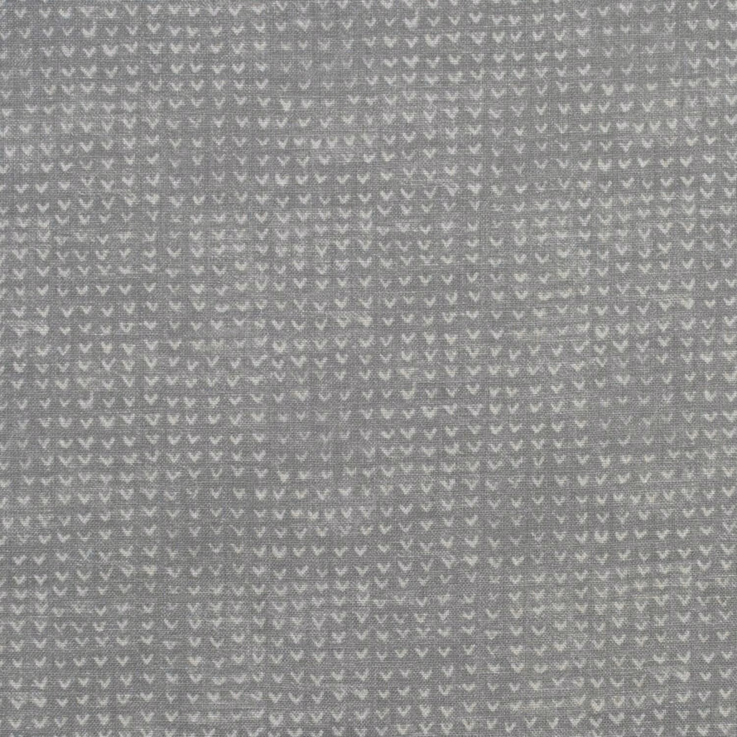 Storm-grey woven fabric with tiny pale chevrons and a softly textured surface