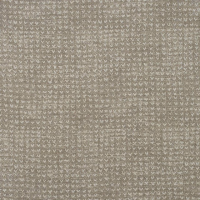 Taupe-grey woven fabric with tiny pale twig motifs and a softly mottled texture