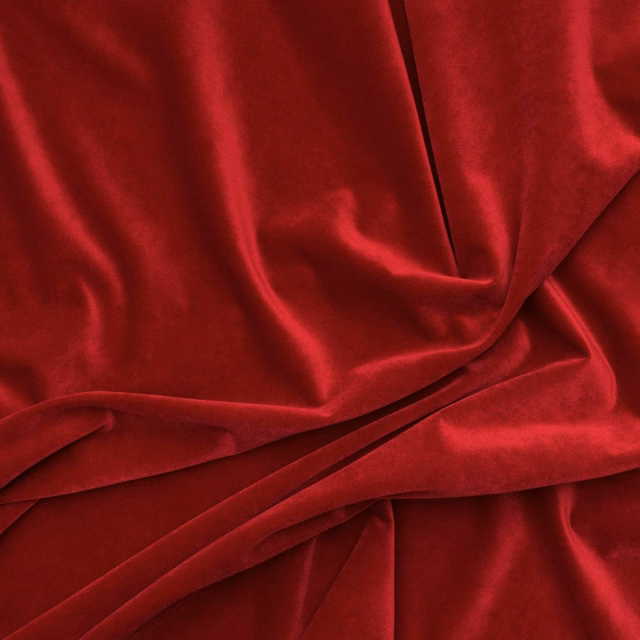Deep crimson outdoor velvet with glossy pile folded into rich red highlights and shadows