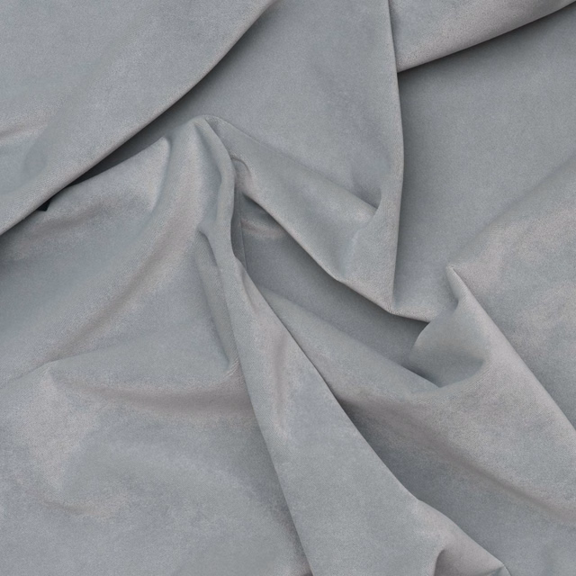 Pale powder blue-grey outdoor velvet with plush nap falling in soft folded drapes