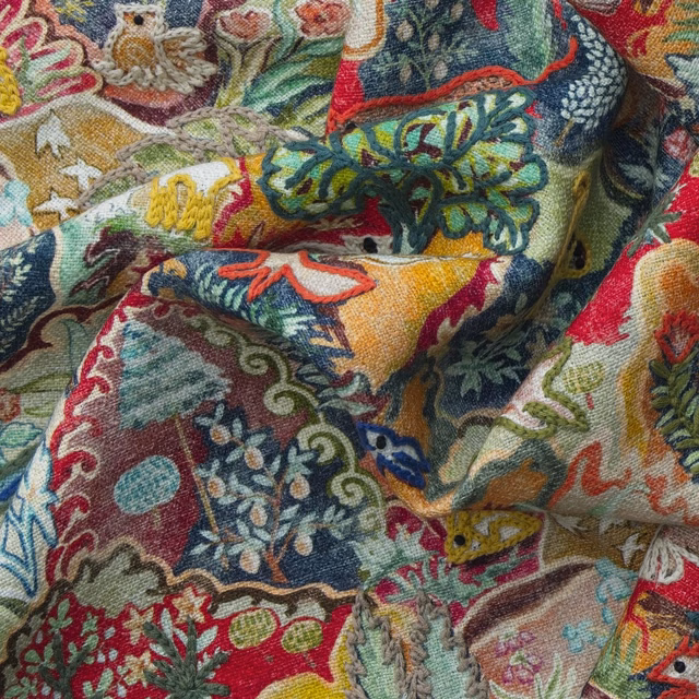 Forest green linen with dense botanical motifs in berry, teal, mustard and coral