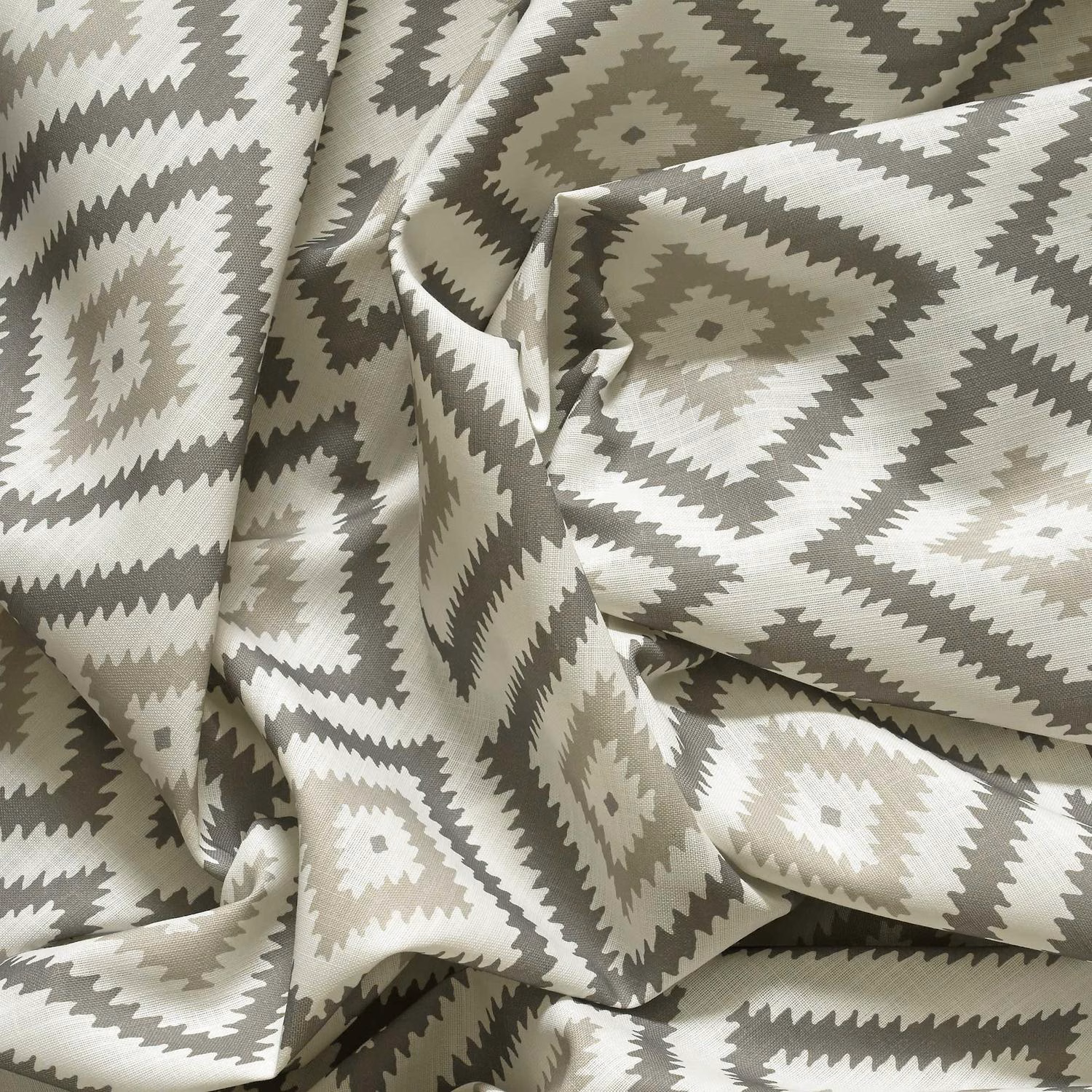 Stone grey outdoor fabric with ivory and taupe geometric diamonds and zigzag borders