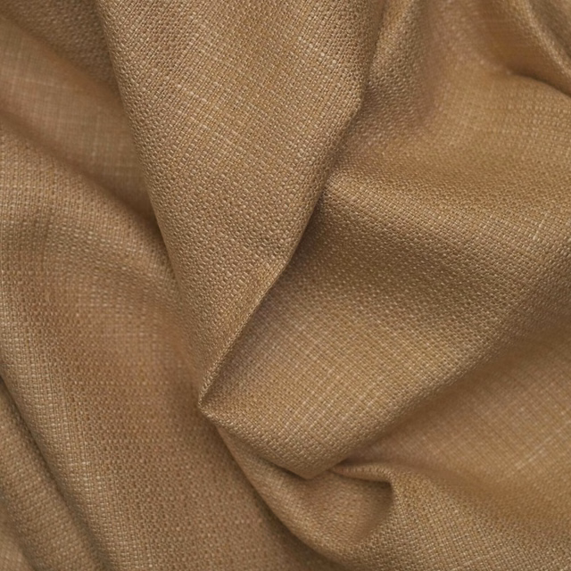 Warm hazel-brown fabric with a fine crosshatch weave gathered into soft folds