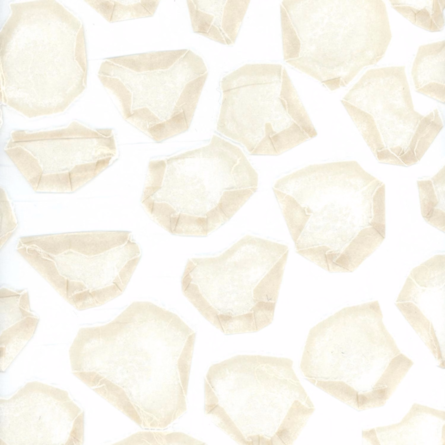 Ivory fabric with irregular pale pebble motifs and softly crinkled texture