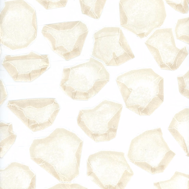 Ivory fabric with irregular pale pebble motifs and softly crinkled texture