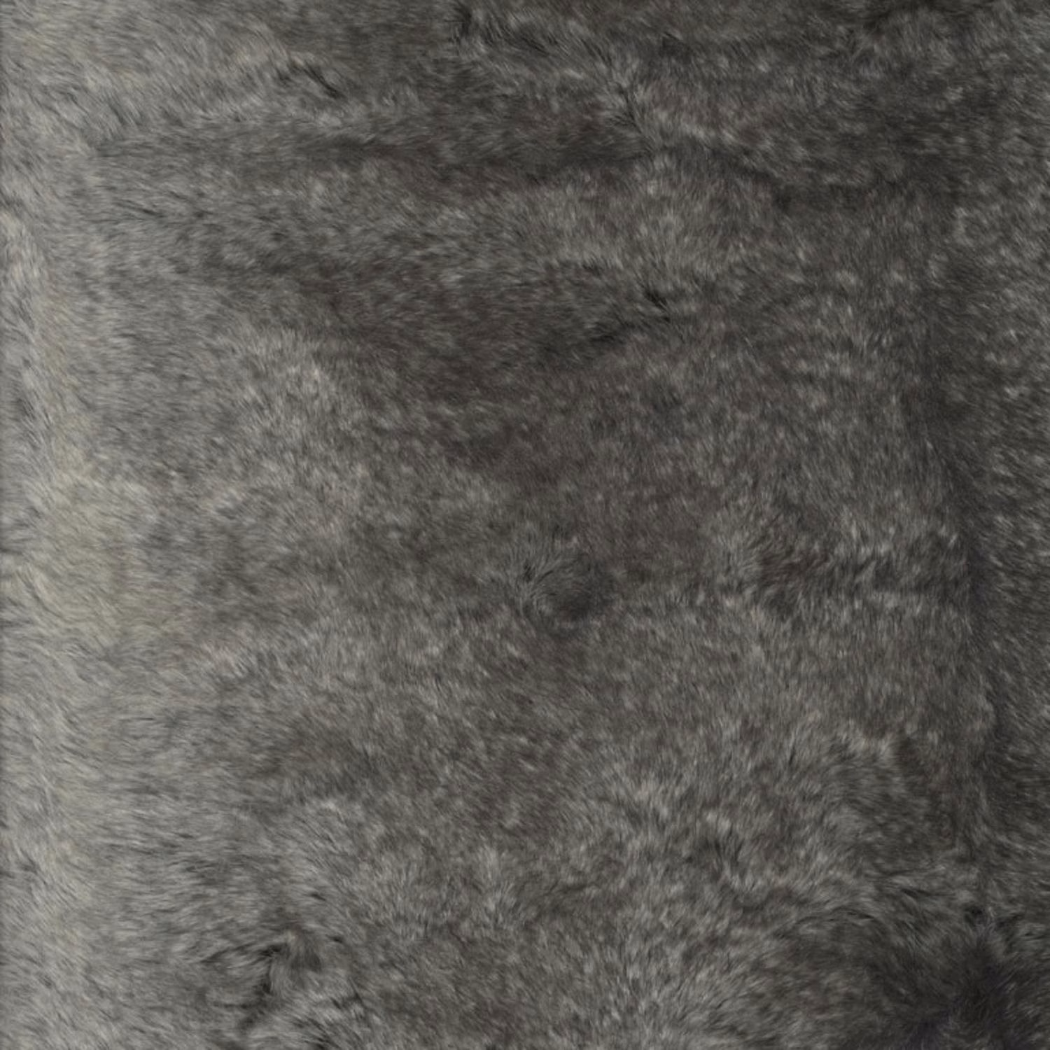 Close-up of charcoal-grey plush fabric with mottled directional pile and soft tonal variation