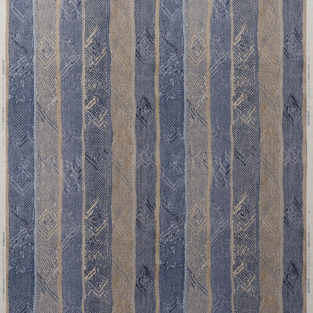 Muted denim-blue and sand stripes with small geometric woven motifs