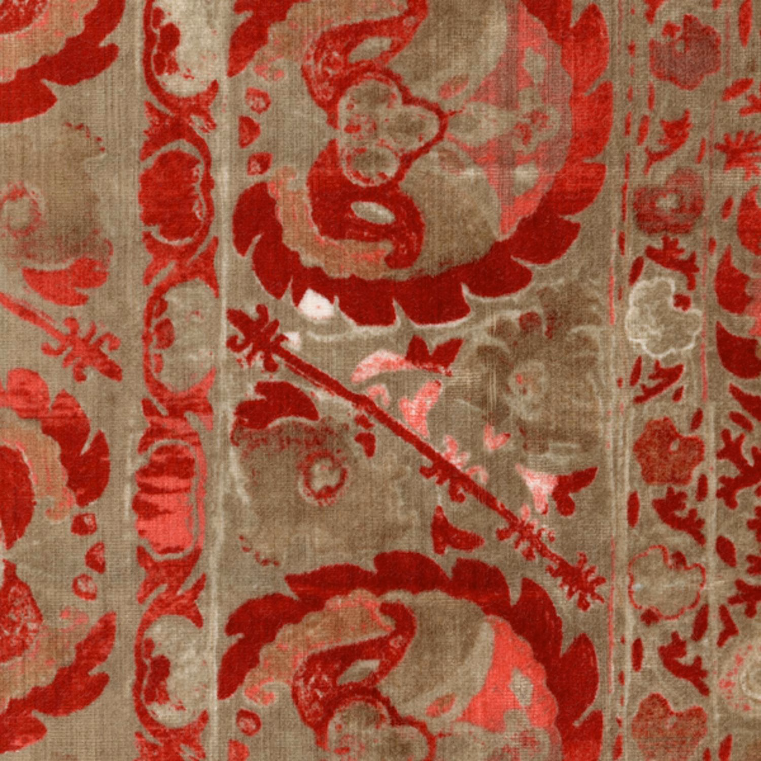 Aged red floral medallions and borders on a taupe textured woven fabric