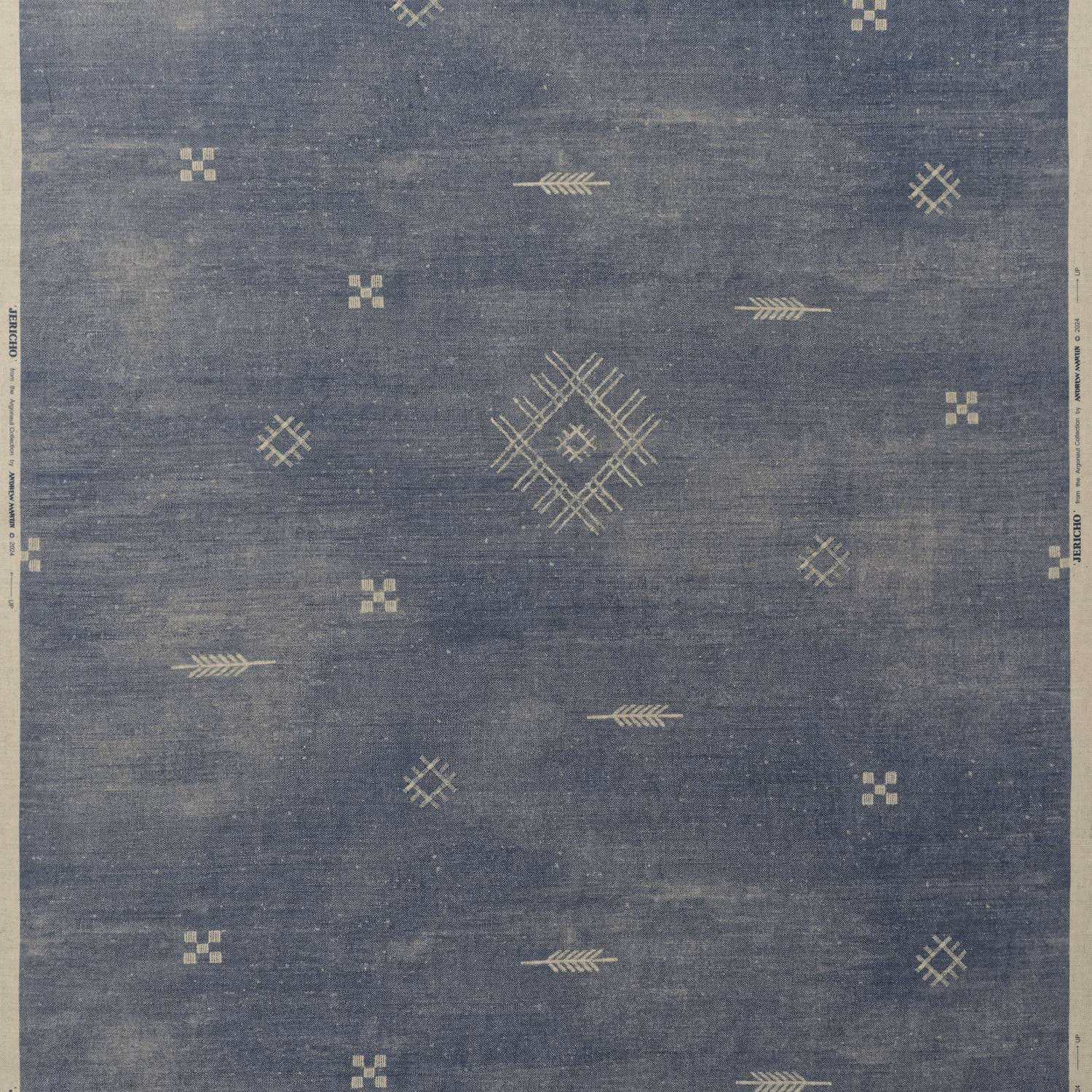 Muted denim-blue woven ground with cream geometric diamonds and arrow motifs