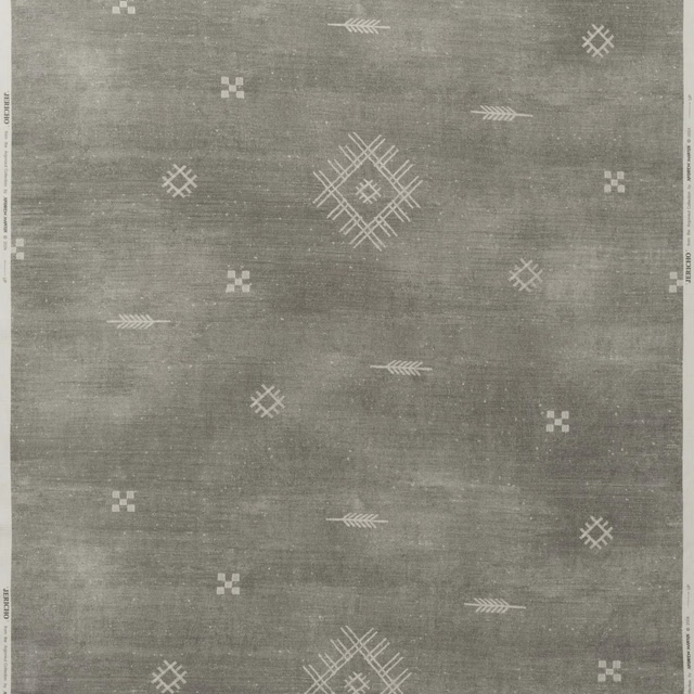 Smoke-grey woven fabric with ivory diamonds, arrows and scattered geometric symbols