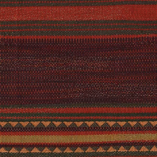 Close-up of burgundy woven textile with olive stripes and ochre geometric bands