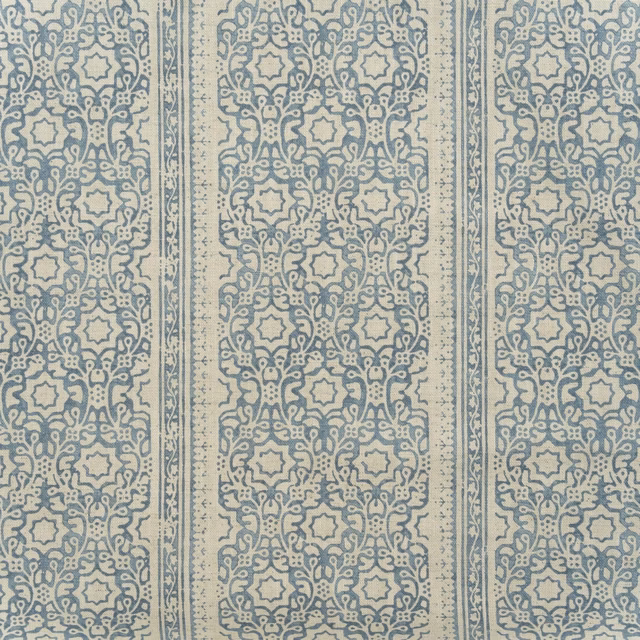Muted denim-blue and ivory cotton print with ornate vertical medallion bands