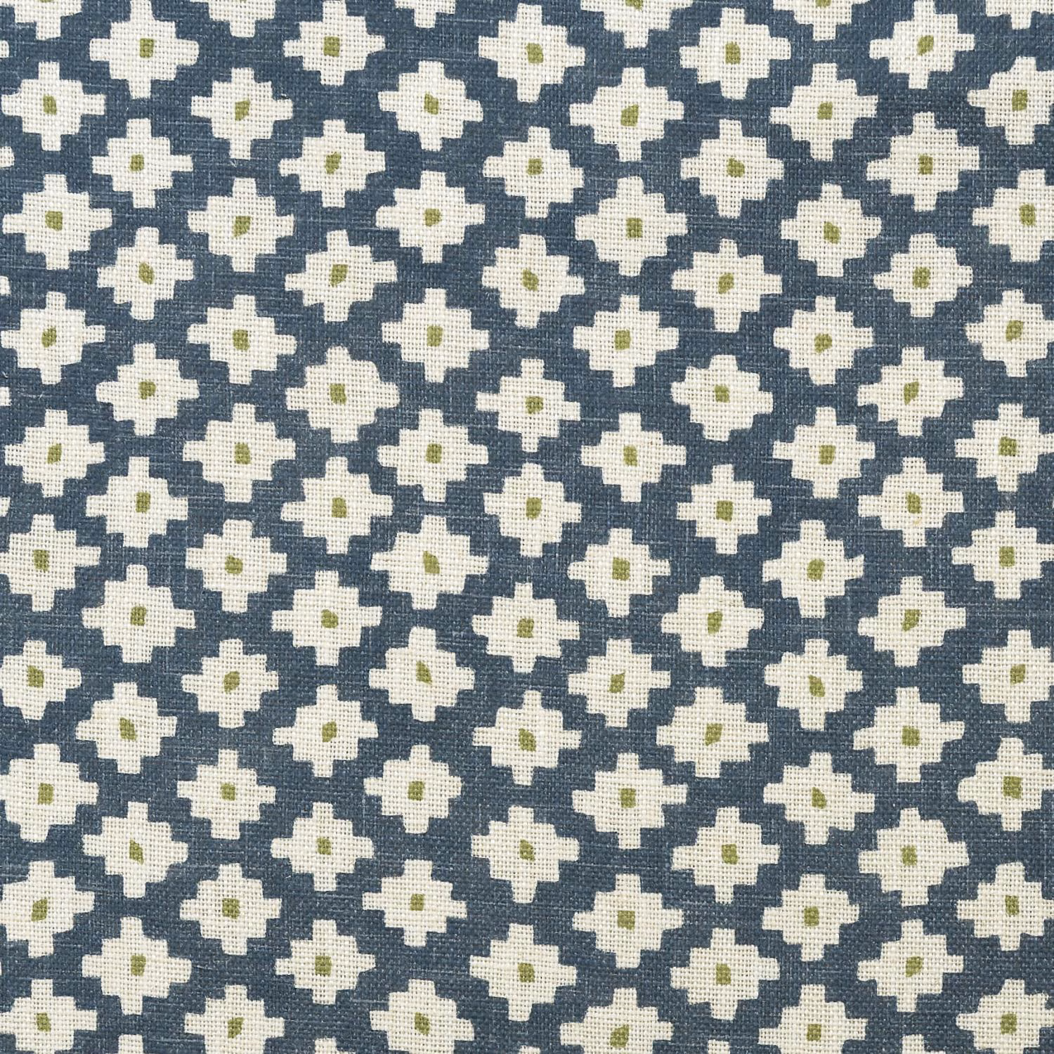Denim-blue woven fabric with cream geometric flowers and tiny olive centres