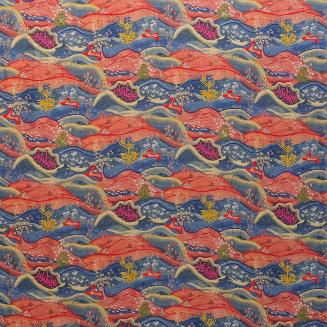 Coral, slate-blue and mustard fabric with undulating hills and tiny red figures