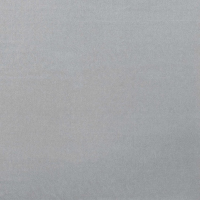Pale cool grey velvet with a softly mottled nap and quiet sheen