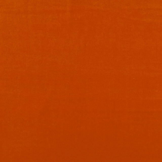 Rich burnt-orange plain velvet swatch with subtle directional pile and soft tonal variation