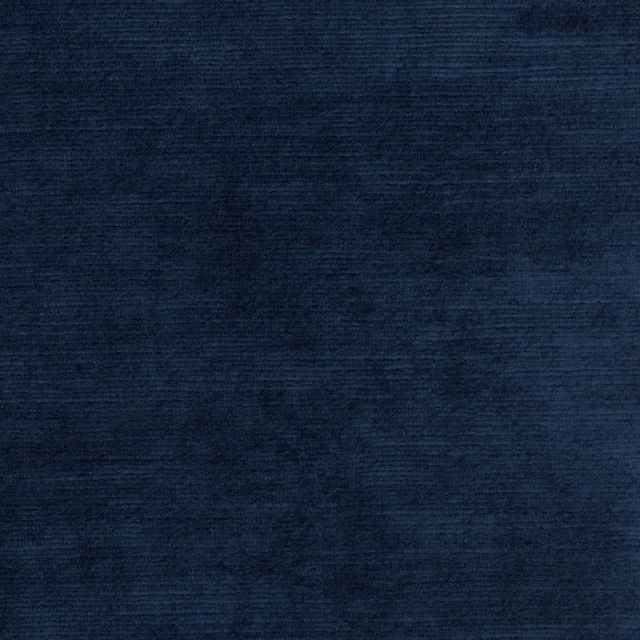 Deep cobalt-blue woven fabric with subtle horizontal striations and dark tonal depth
