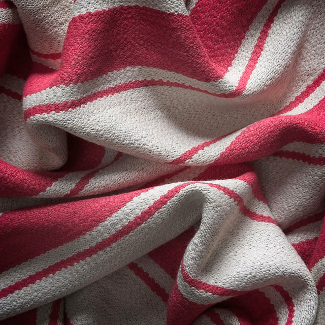 Raspberry and ivory woven stripes gathered into softly sculpted folds