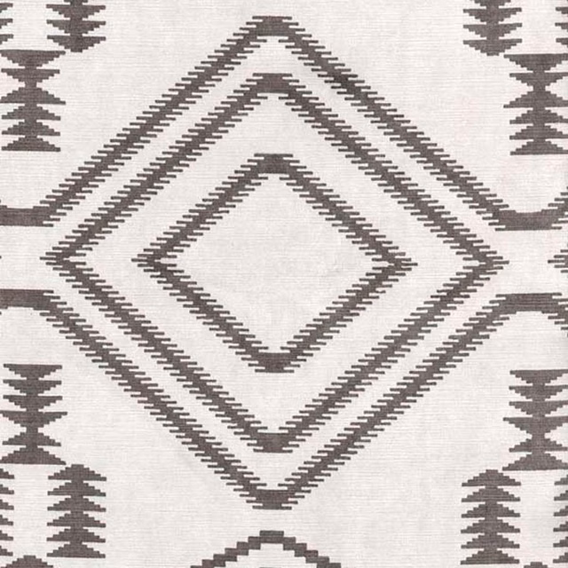 Ivory woven ground with charcoal-grey concentric diamonds and stepped motifs