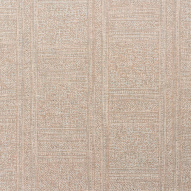 Pale blush-pink woven textile with vertical ornamental panels and fine geometric detail
