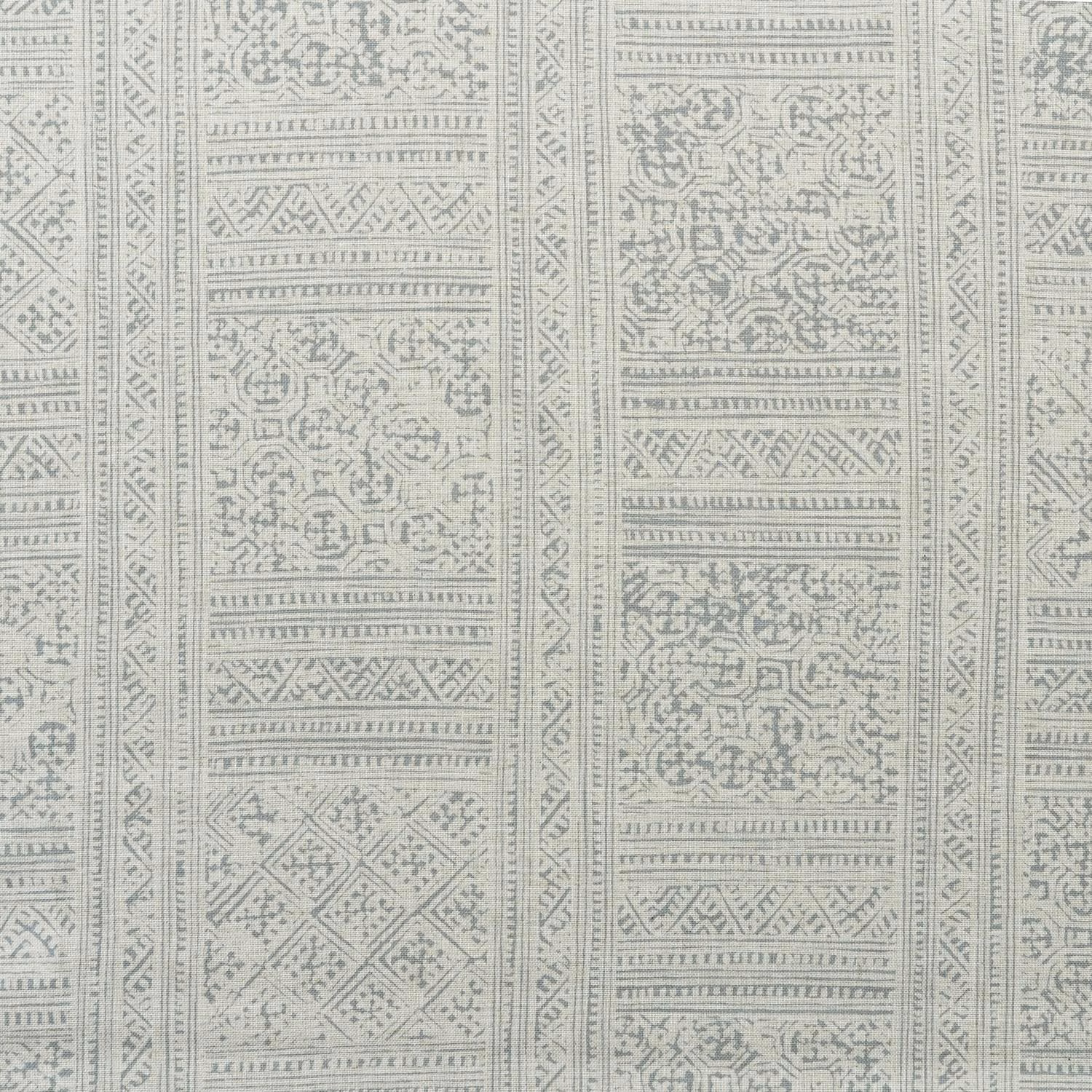 Pale storm-grey and ivory fabric with vertical geometric and ornamental woven-looking panels