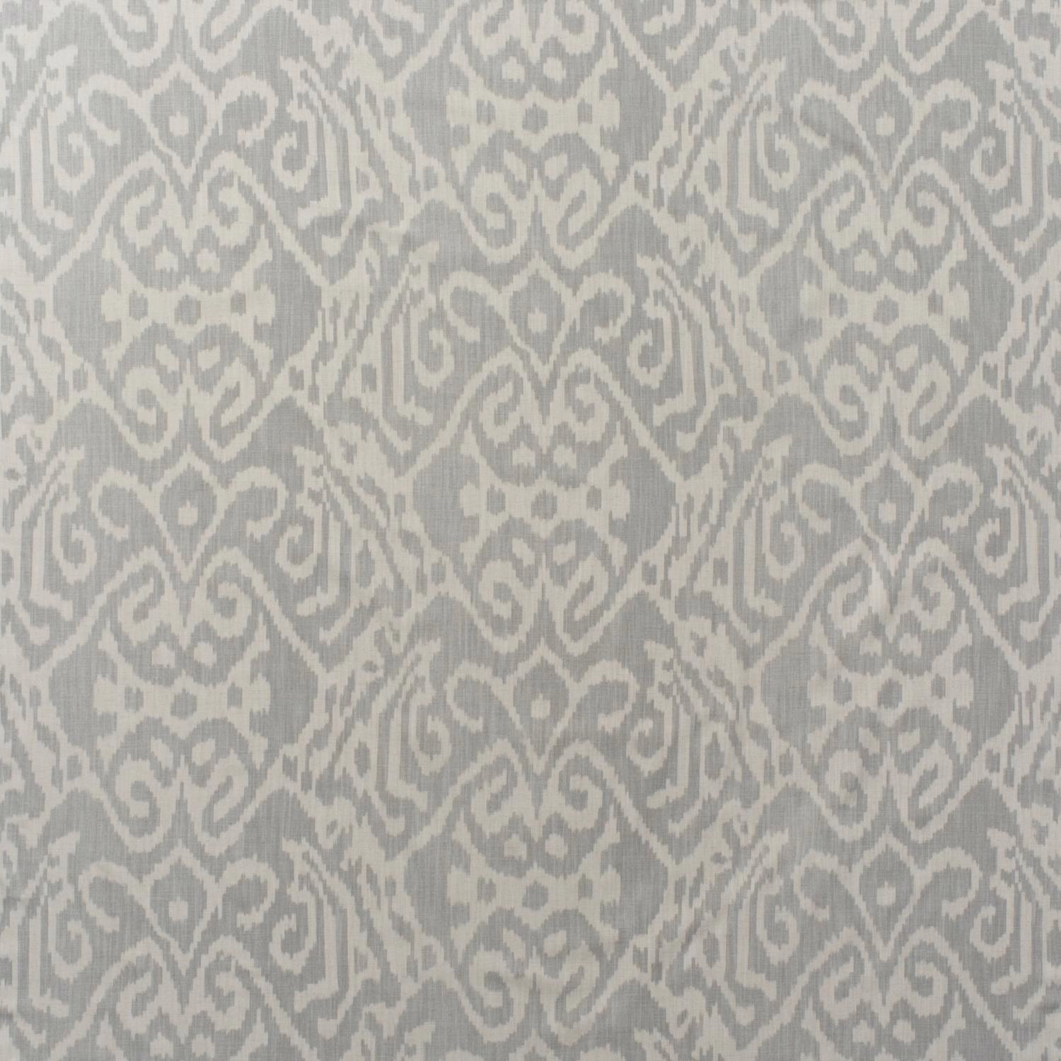 Cool grey ikat scroll motifs on a pale cloud cotton ground