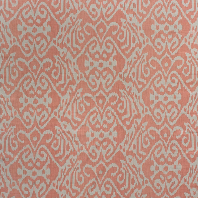 Dusty coral cotton print with pale blue-grey ikat motifs and fine vertical texture