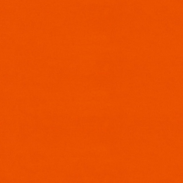 Saturated clementine-orange plain fabric with a softly brushed, subtly textured surface