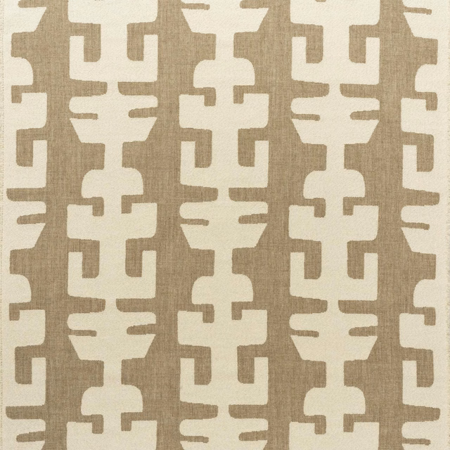 Warm ivory and taupe interlocking geometric fabric with a visibly textured woven surface