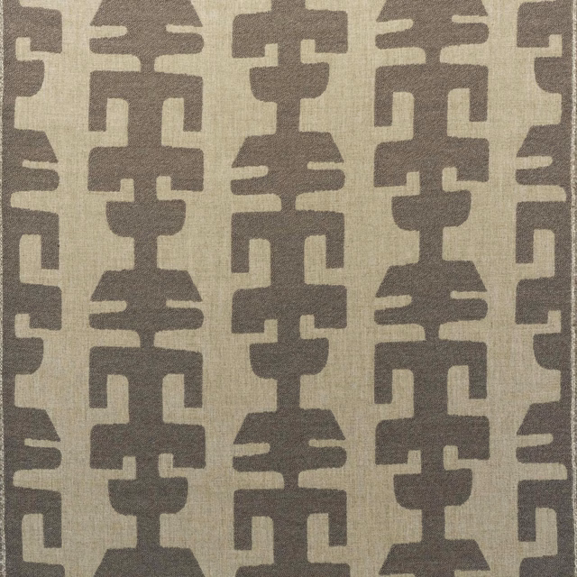 Muted taupe geometric motifs on a beige woven fabric ground