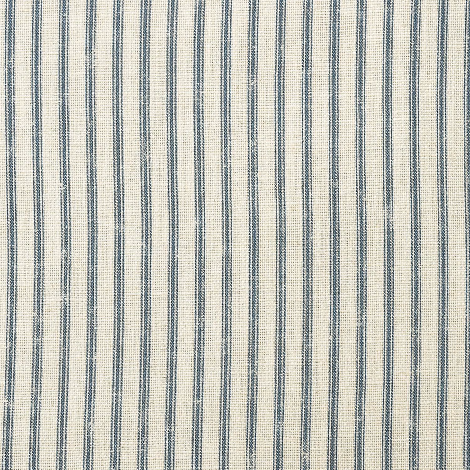 Muted denim-blue vertical stripes woven across a warm cream fabric ground
