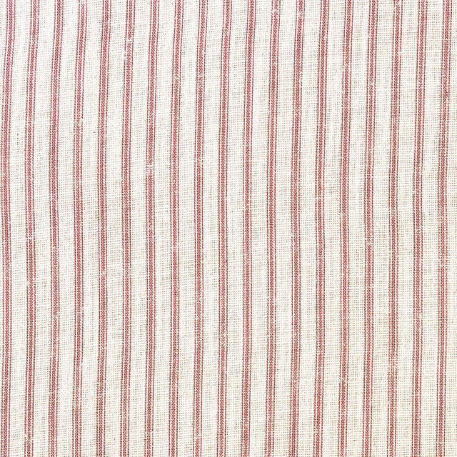 Fine ivory weave with irregular dusty-pink vertical stripes