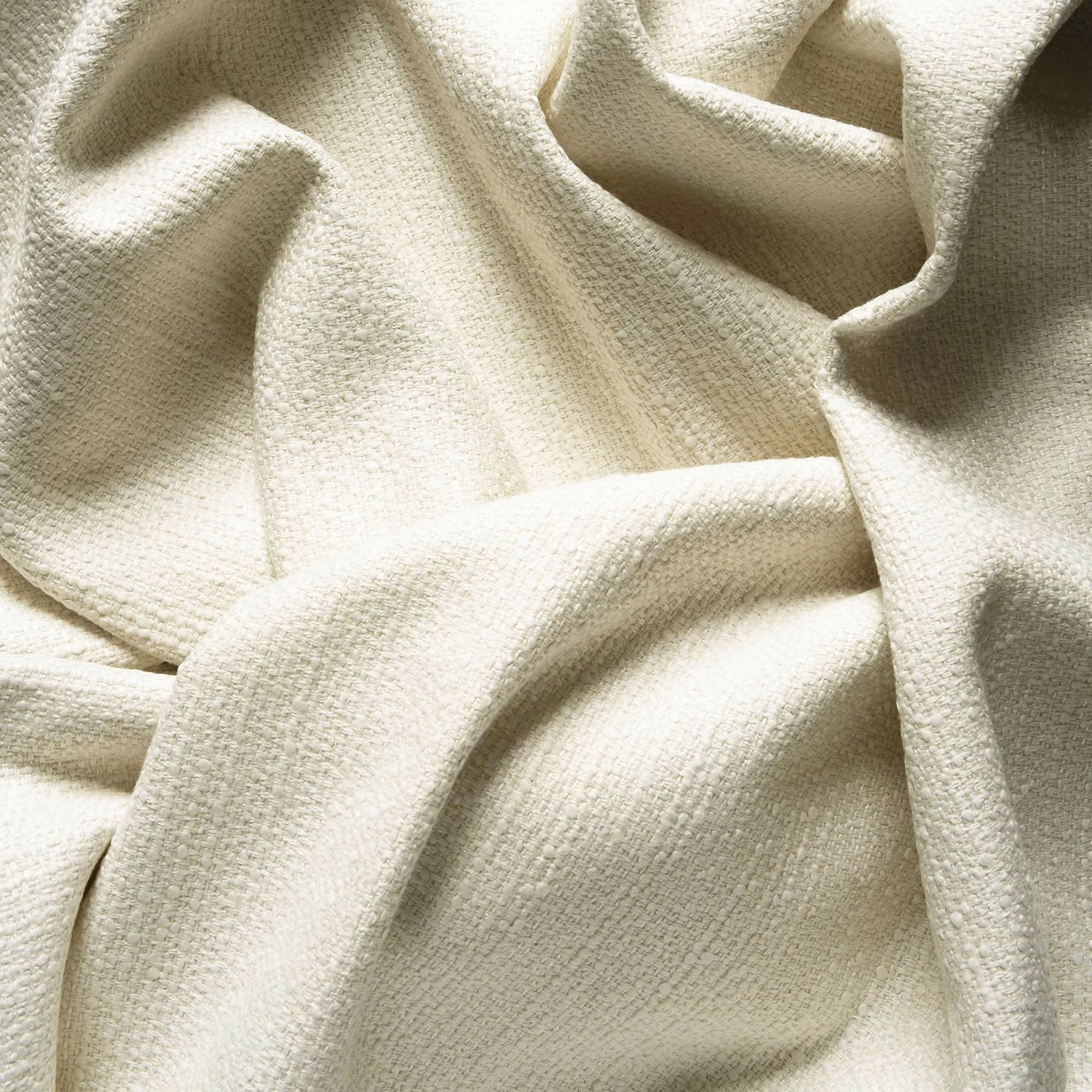 Warm ivory Ravello textile with a fine linen-look weave in layered folds
