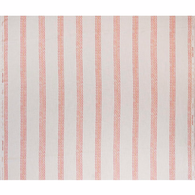 Pale blush fabric with fine, wavy geranium-pink vertical stripes
