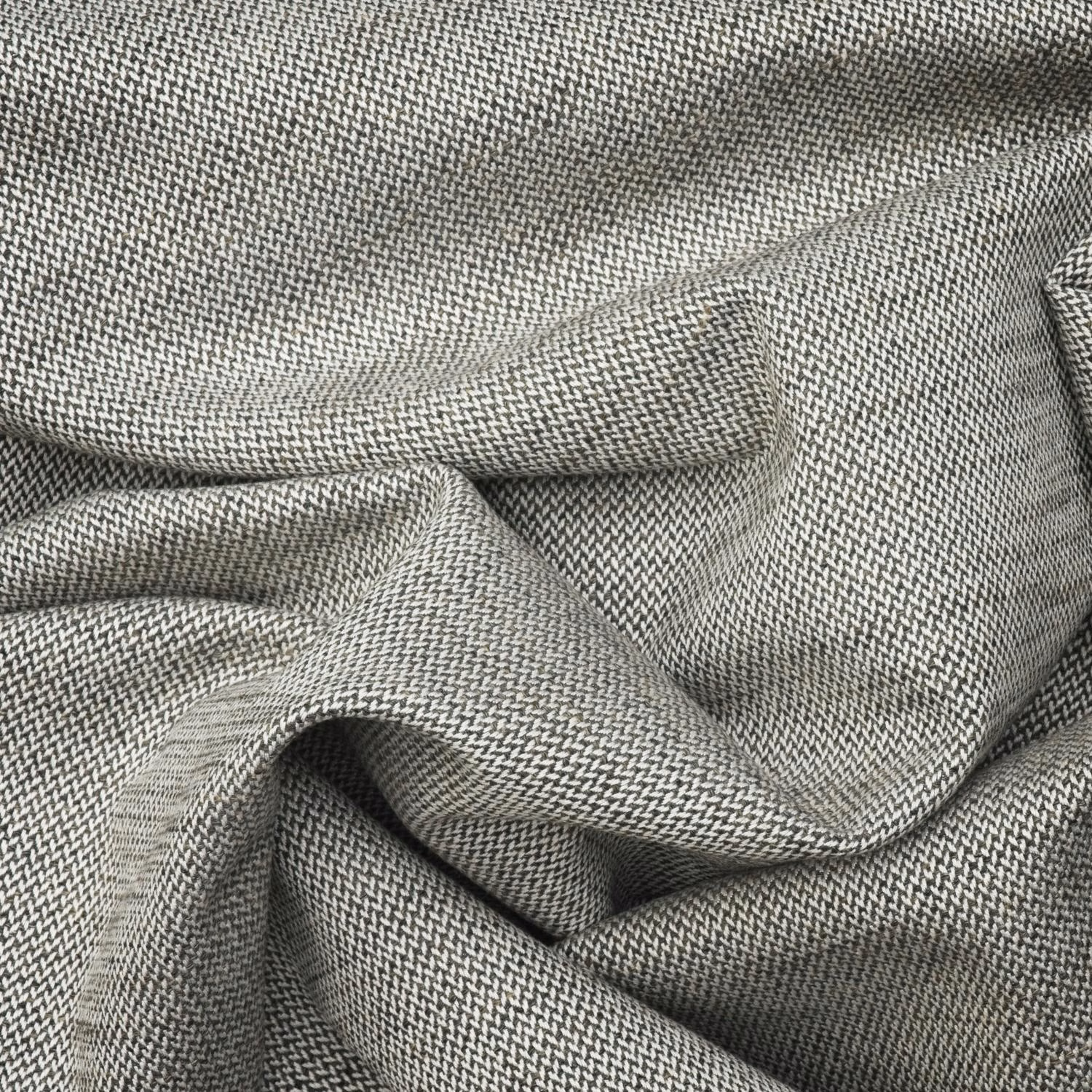 Dark grey herringbone textile with a tightly woven, lightly flecked surface