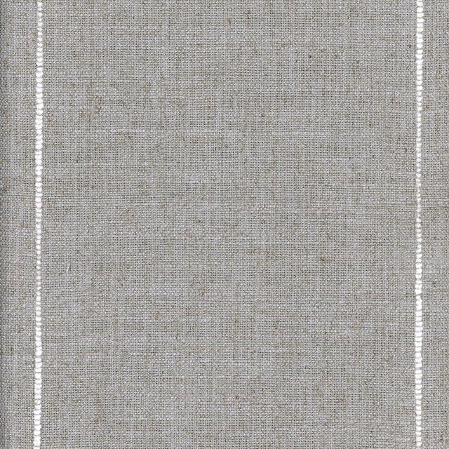 Close-up of pebble-grey taupe Selvaggio weave with subtle mottled texture