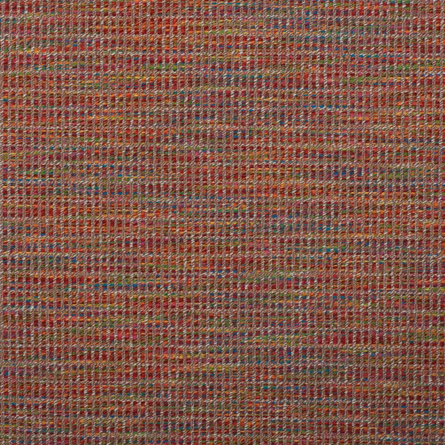 Close-up of rust red woven textile with teal, ochre and cream flecks